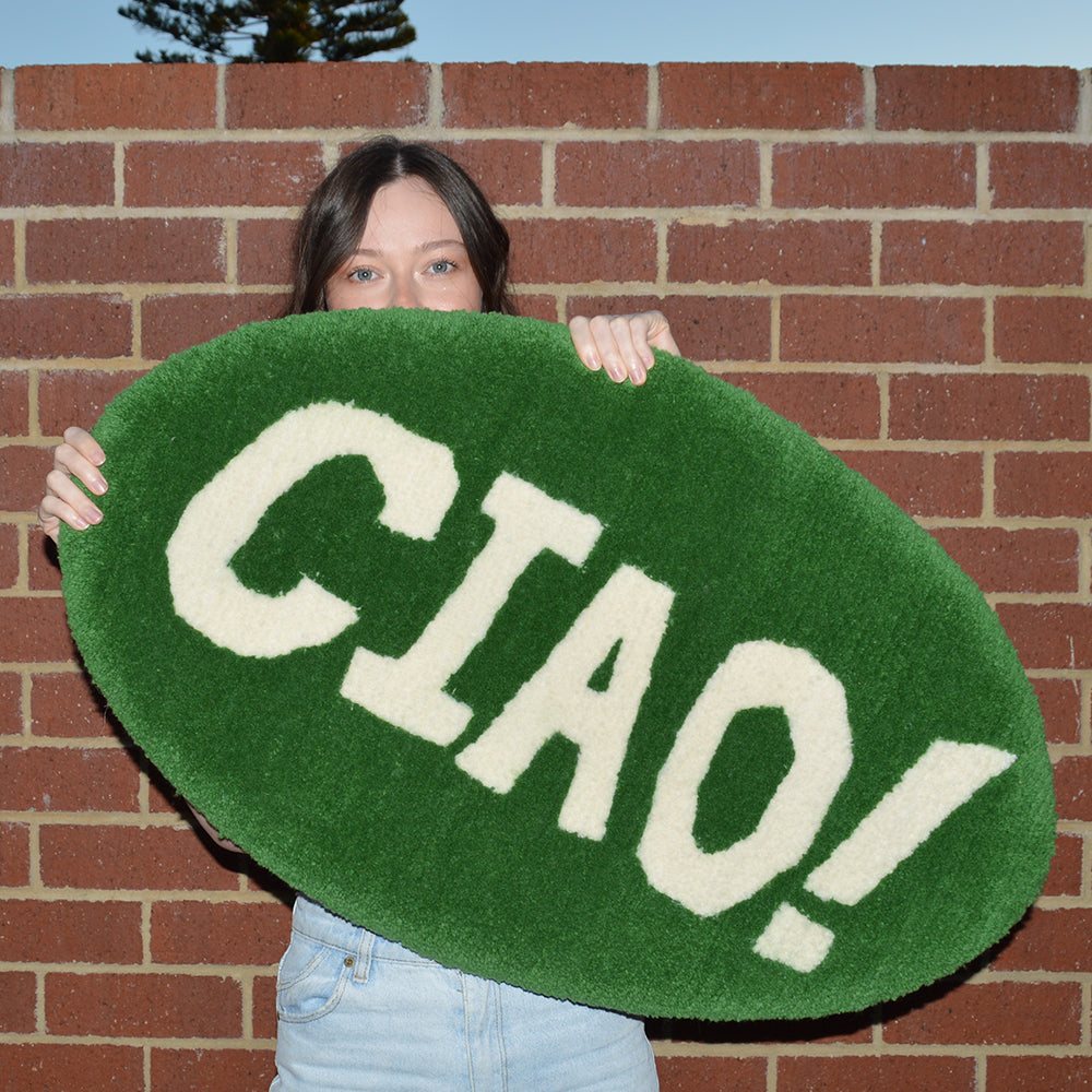Woman Holding Casaprima Ciao Rug