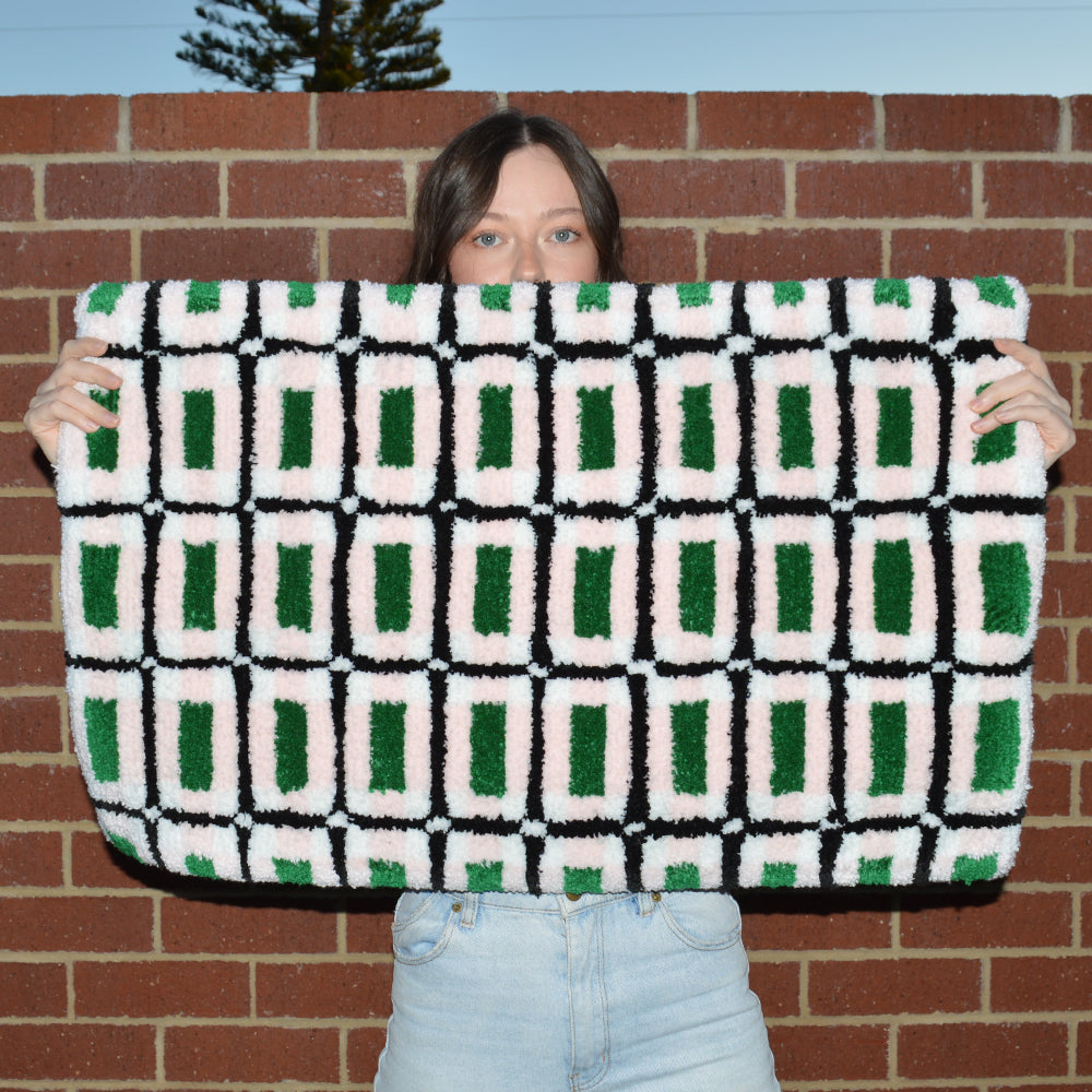 Woman Holding Casaprima Plaid Rug