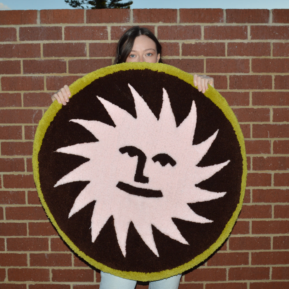 Woman Holding Casaprima Sun Rug