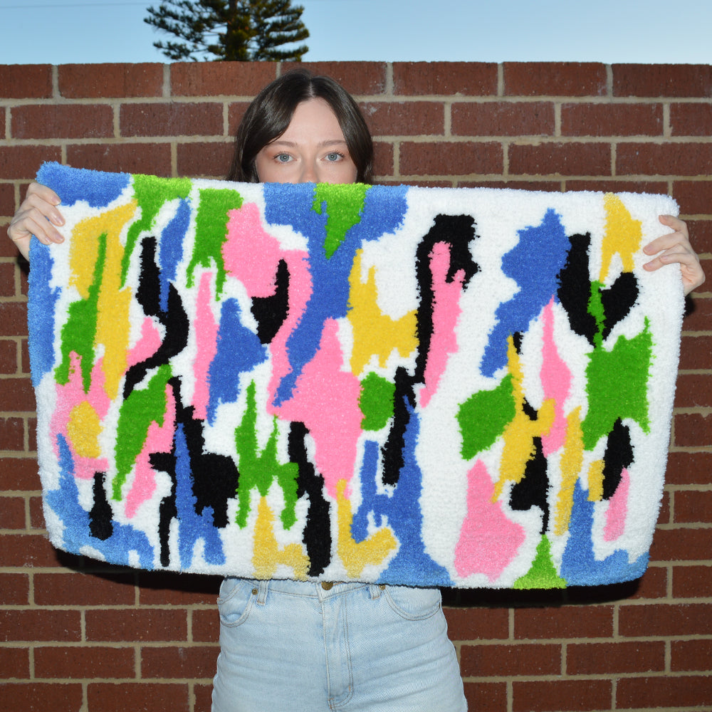 Woman Holding Casaprima Impressionist Rug